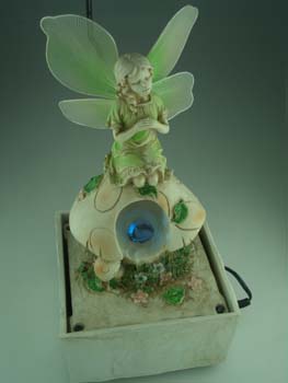 FOUNTAIN FAIRY ON MUSHROOM GRN